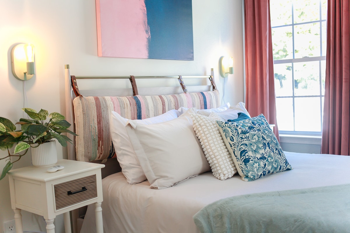 Beautifully styled second queen bedroom