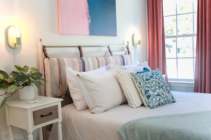 Beautifully styled second queen bedroom