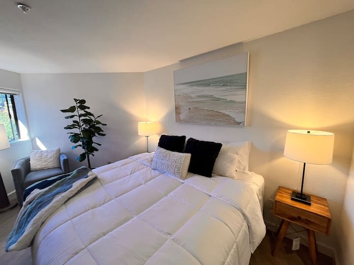 New king mattress in master bedroom. On suite bathroom and 50” TV.