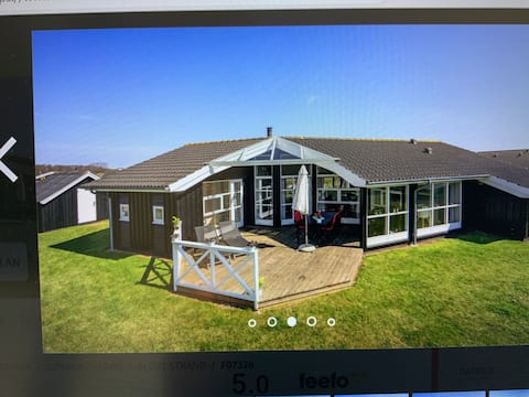 Lovely large cottage by Flovt beach.