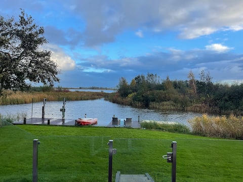 Water villa with unobstructed views, swimming pool and boats.