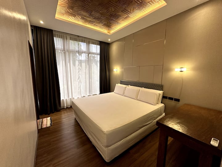 Guest Bedroom 1 (2/f)
1 king-sized bed
* 2 adults, 1 child
* with private bathroom -- hot & cold shower, toilet w/ bidet