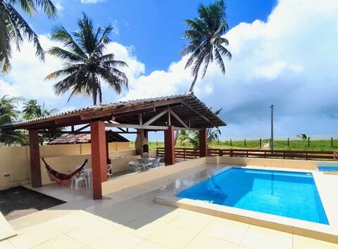 House by the sea, with a pool