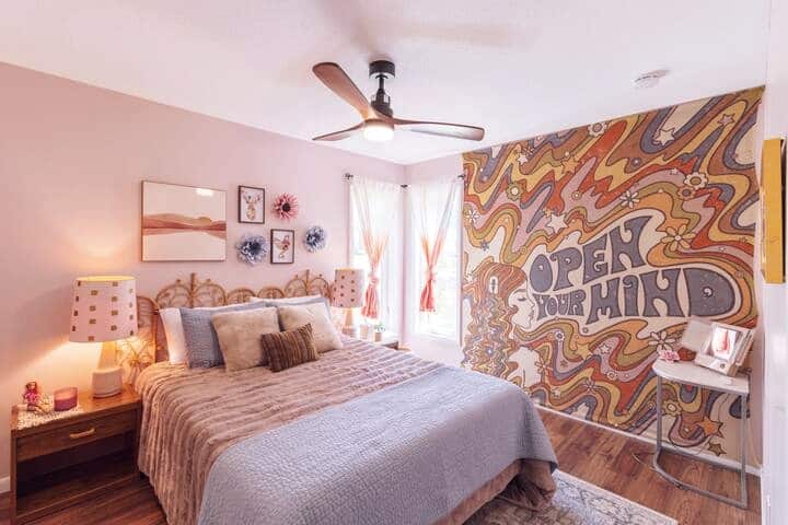 Bedroom #2 featuring a queen sized bed and an amazing accent wall.