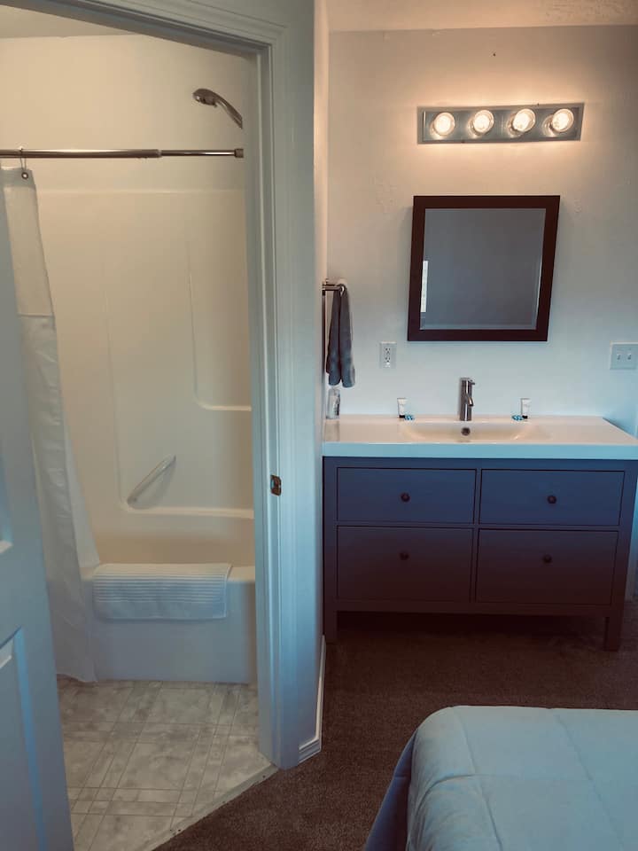 Queen bedroom - vanity and bathroom. Each bedroom has its own vanity and bathroom.