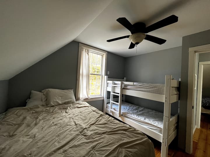 Second floor bedroom - queen bed and twin bunk beds.  