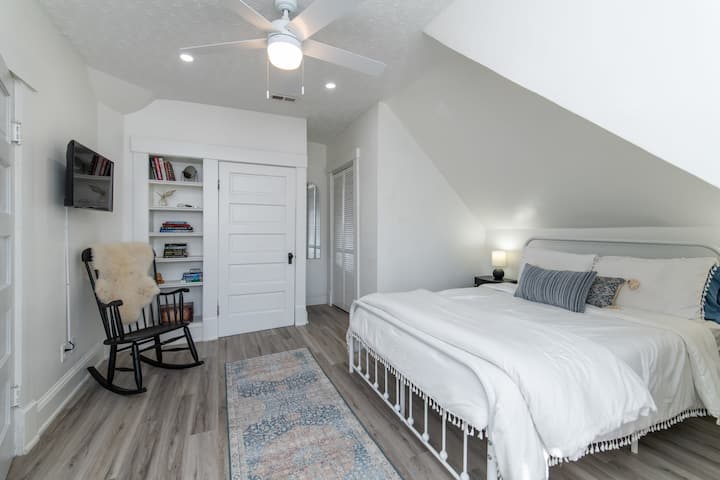 The loft - your private haven, boasting a queen-sized bed tucked away in its own cozy bedroom sanctuary.
