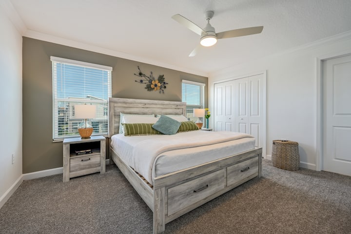 Enjoy high quality mattresses and linens in the spacious bedrooms-this is the Primary Suite featuring a King Size bed