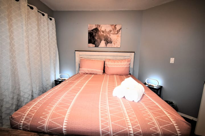 Upstairs bedroom #3. With entrance to the back covered porch.