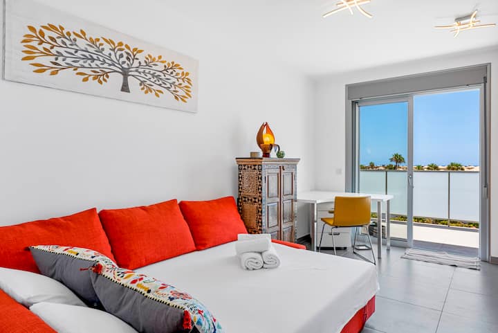 Segundo dormitorio con sofá cama, tamaño queen y aire acondicionado