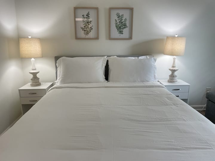 Bedroom 1 with queen bed and sleeper sofa