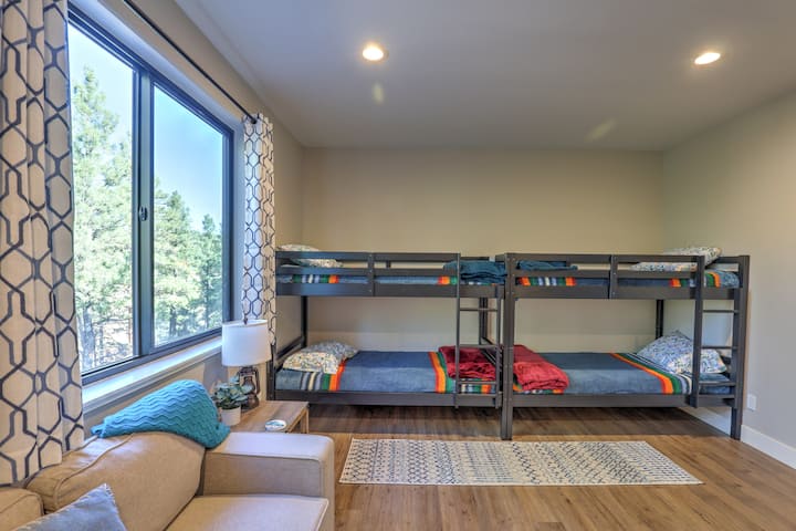Bunkroom with large sectional, 65" TV, two sets of twin bunkbeds....and a view!