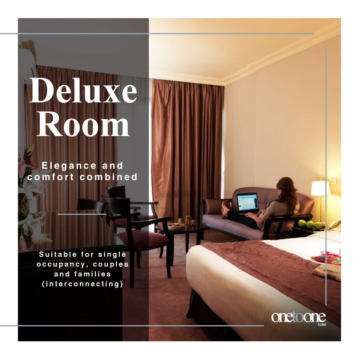 A spacious room is presented with a large bed covered in soft bedding. A work desk is positioned nearby, accompanied by a comfortable chair. Natural light enters through a window, highlighting the neutral decor. Additional seating is available, making it suitable for various guest arrangements.
