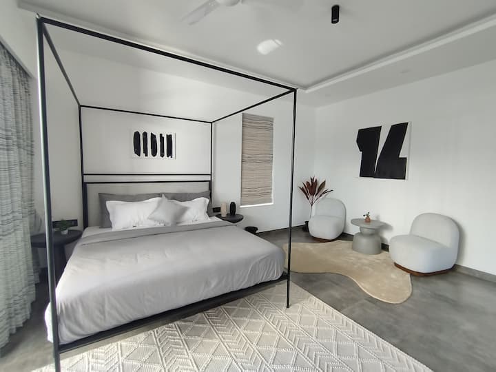 Spacious and Luxurious Bedroom with Elegant Interiors.