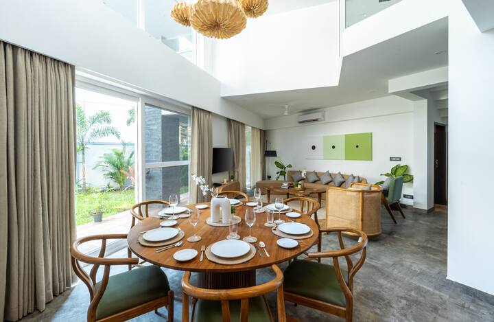 Bright and Airy Dining Room with Sophisticated Interiors.