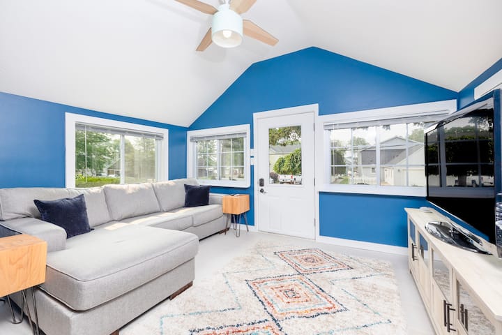 A cozy room where the wifi router is located as well as the wifi password. There is a smart Tv with a Roku stick. We do have a few board games and a couple decks of cards under the TV as well. 