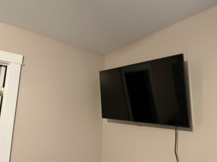 Smart TV in primary suite.