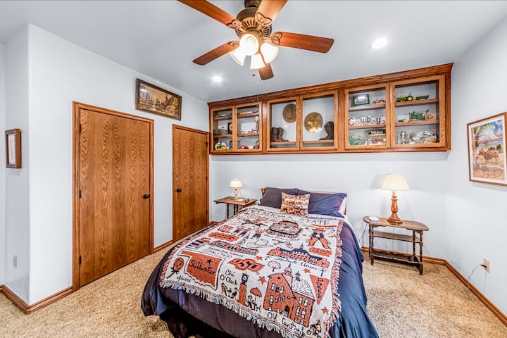 Welcome to our cozy Cowboy Room! This inviting space features a queen-size Sleep Number bed, allowing you to adjust the firmness to your perfect comfort level.  A guest favorite for both style and sleep quality.   