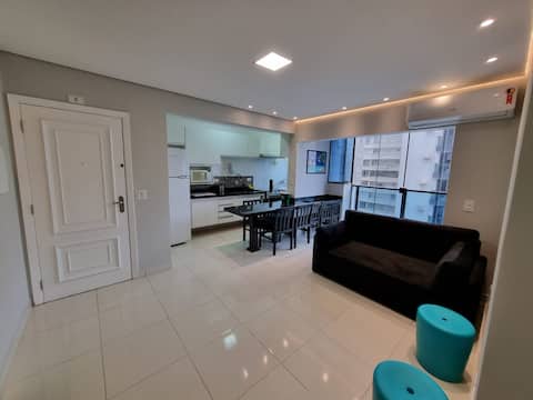 Successful Airbnb property: Beautiful Apartment with Side Sea View in Guarujá