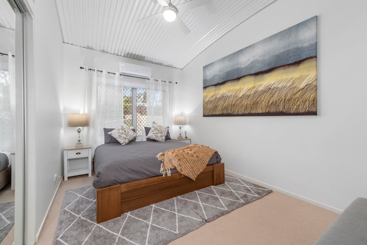 Our guests regularly mention the super comfy beds and this third room provides a king size bed, with lots of windows to capture the breezes or there's air conditioning and ceiling fan.