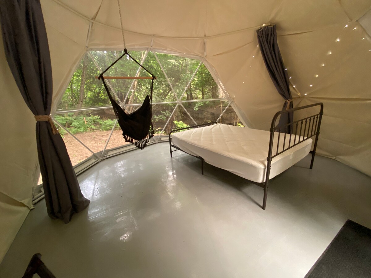 Bring your own bedding or sleeping bag for this comfy queen size bed. 
Enjoy the view from your hammock style chair. 