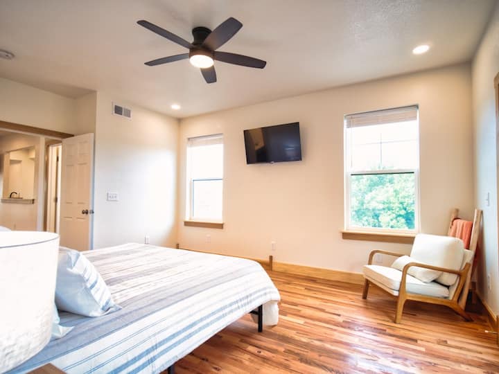Relax and unwind in this beautifully designed half bathroom accessible from the living area.