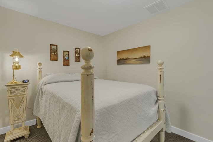 Walk out basement level BEDROOM 5 with attached full bath. Queen size bed