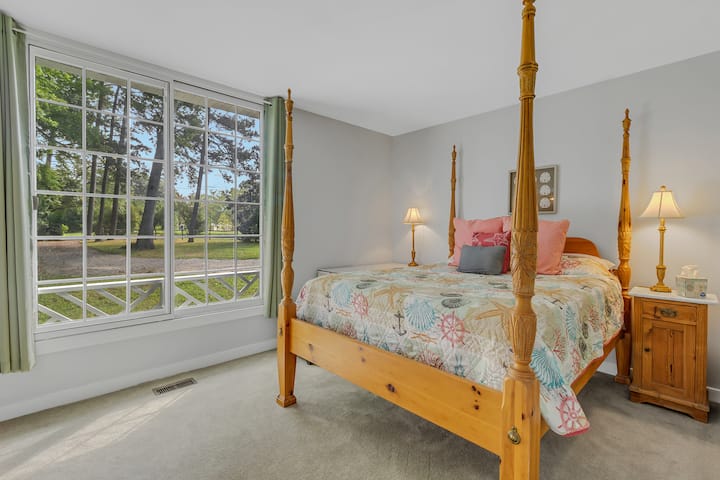Entry level BEDROOM 4 with queen size bed and attached full bath.