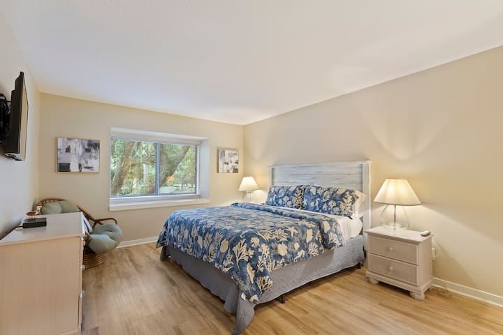 Large master bedroom with king bed.