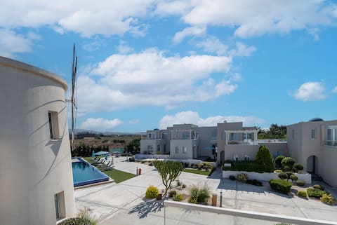 Sea-front villa with roof patio