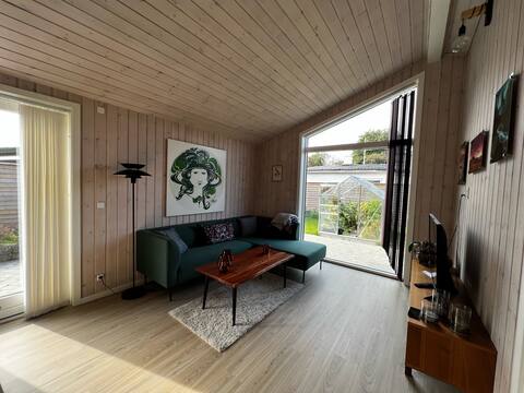 Cozy wooden house with garden