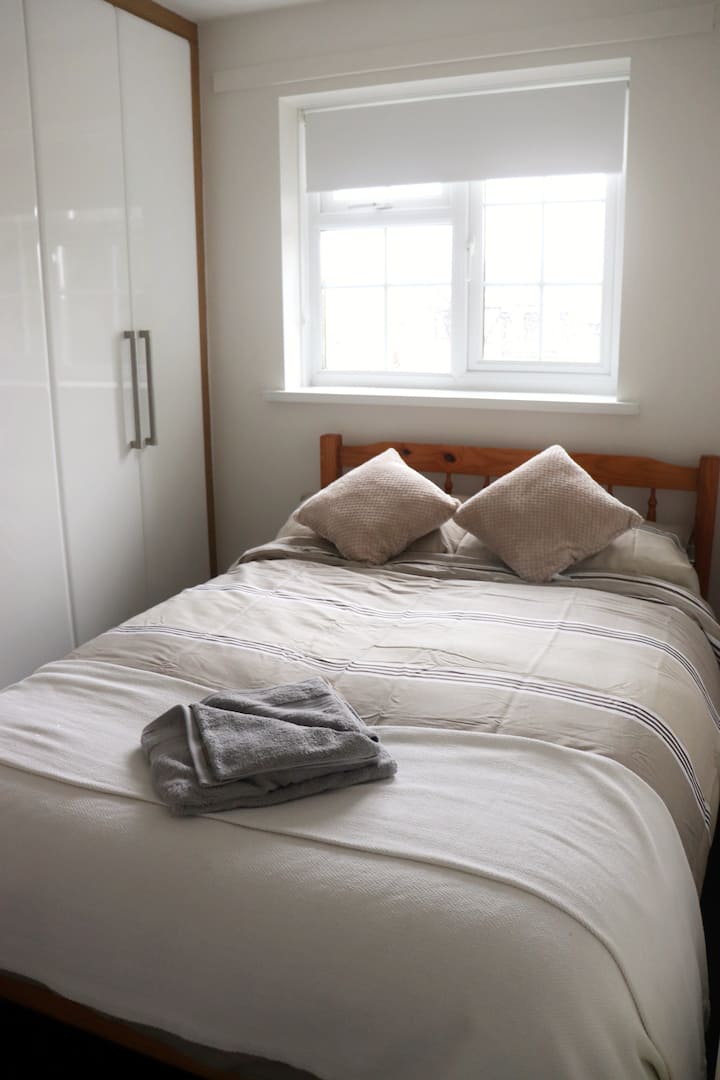 Third bedroom with small double bed.