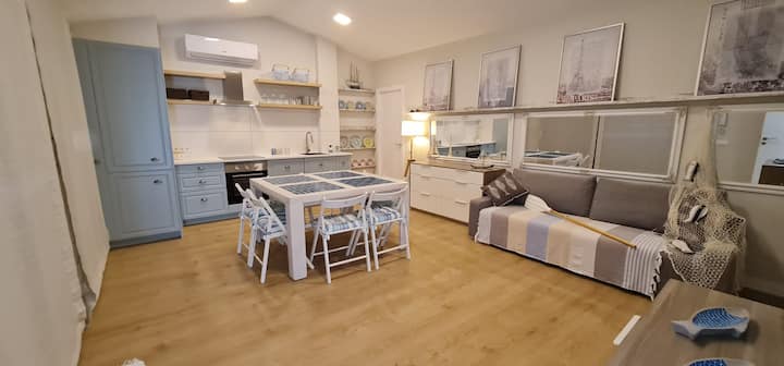 Salón comedor con cocina abierta