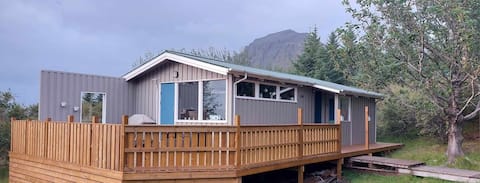 Cabin by mountains