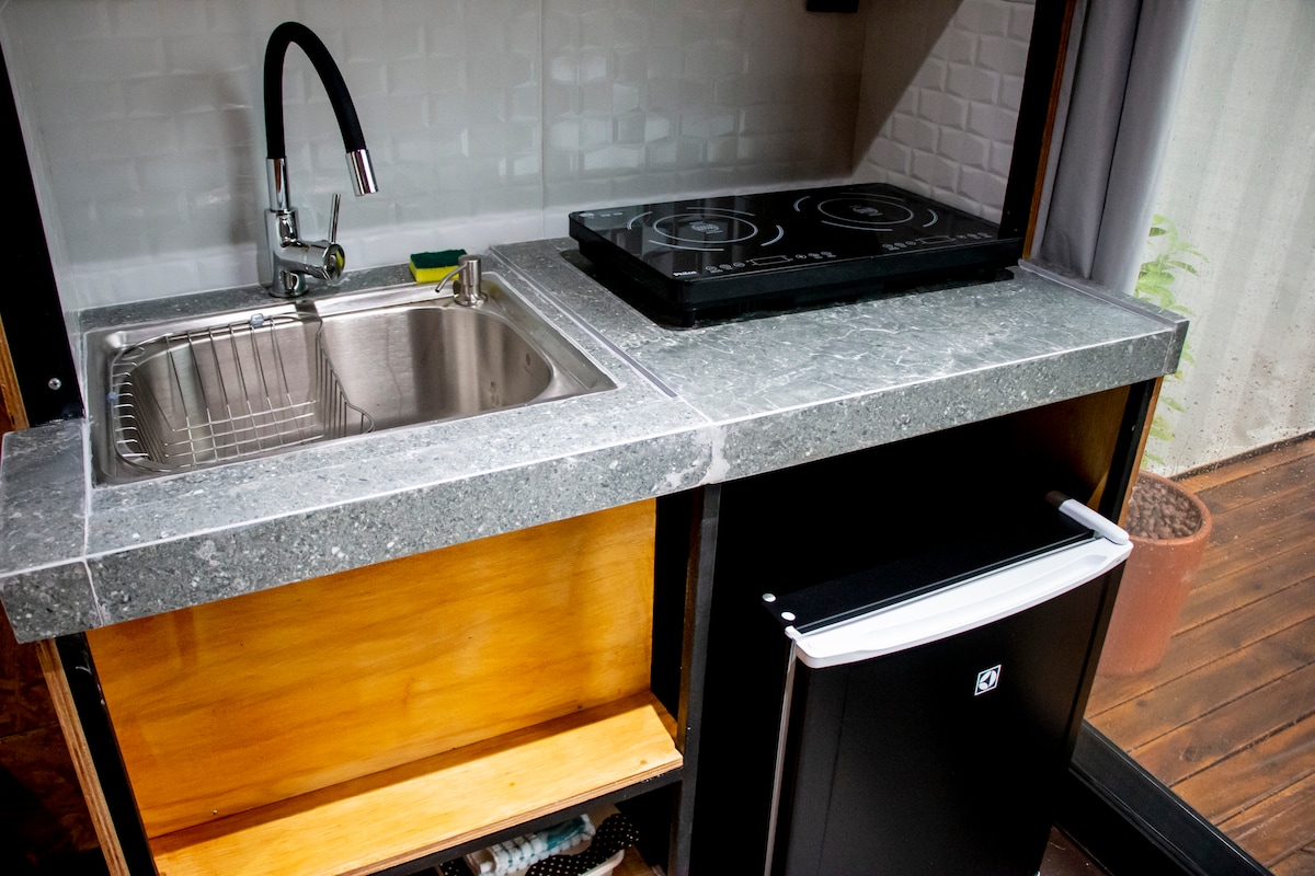 Popular Airbnb listing: Green Suite: balcony with sea view and mini-kitchen in São Sebastião