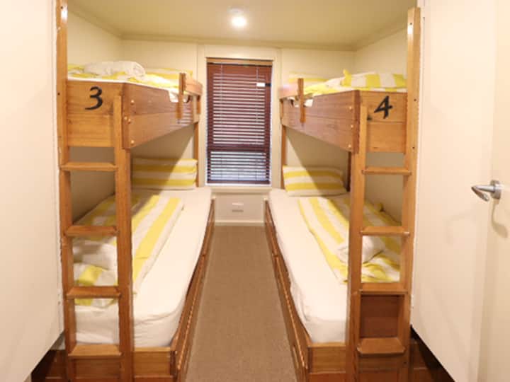 Second bedroom with 4 adult bunk beds