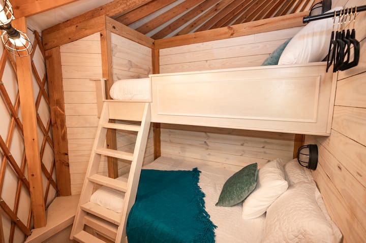 The Second Bedroom features a Twin over Full Size Bunk Bed - perfect for the kiddos or adults alike to get a good nights sleep on the also super comfortable mattresses!!