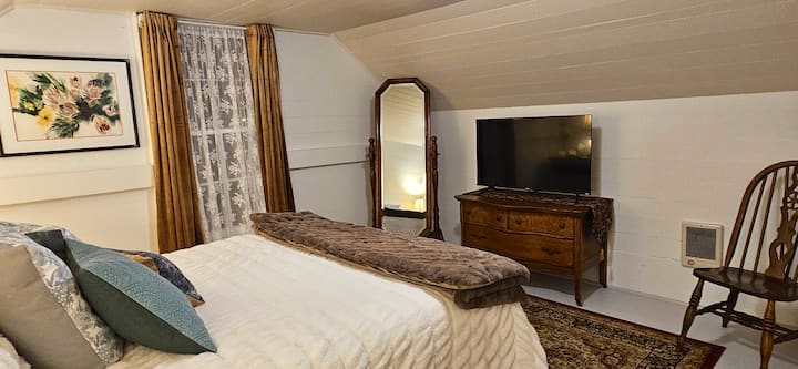 Full length cheval mirror in the upstairs bedroom.