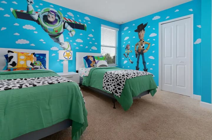 Join the Toys in our Toy Story themed room with two twin beds