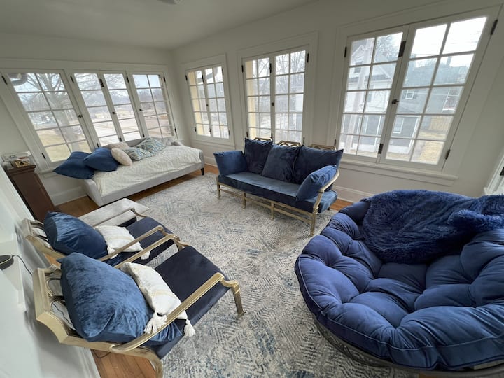 Second floor sunroom has a day bed (sleeps one) and is connected to the Main bedroom and a queen bedroom (bedroom #3)