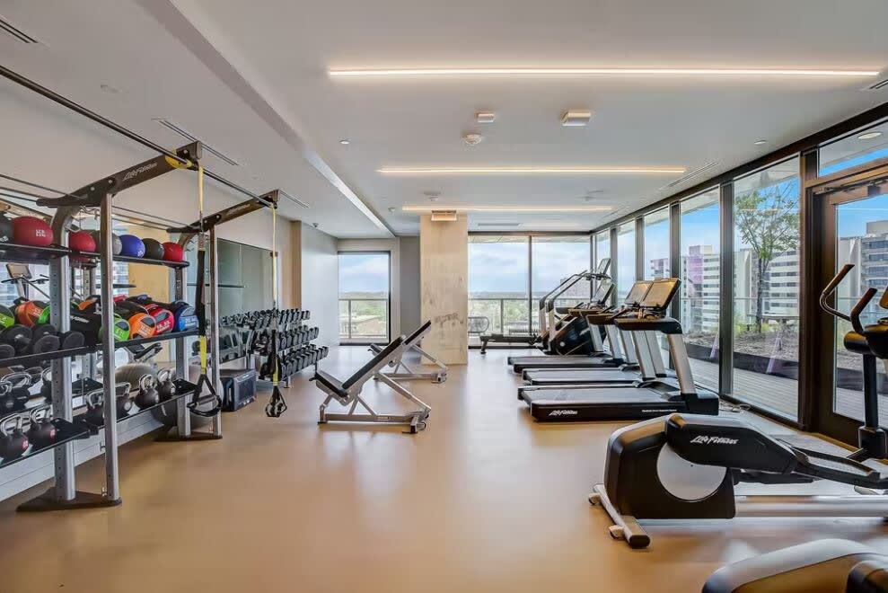Riverside Condo | Luxury High-Rise + Rooftop Pool!