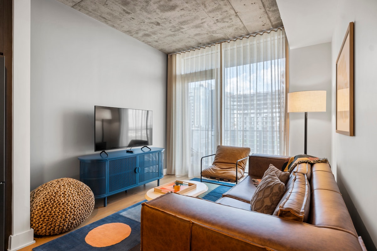 Riverside Condo | Luxury High-Rise + Rooftop Pool!