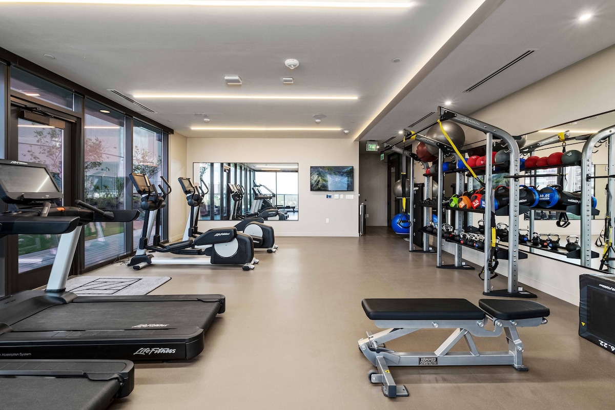Riverside Condo | Luxury High-Rise + Rooftop Pool!