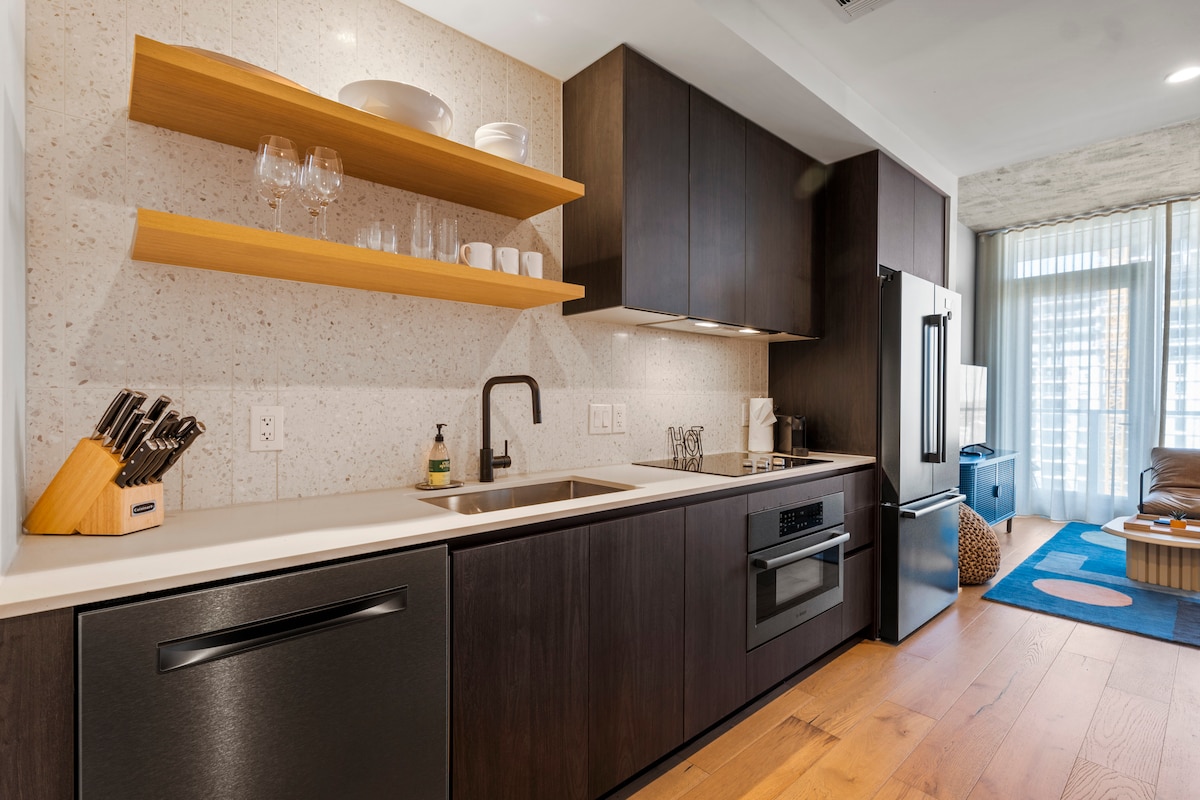 Riverside Condo | Luxury High-Rise + Rooftop Pool!