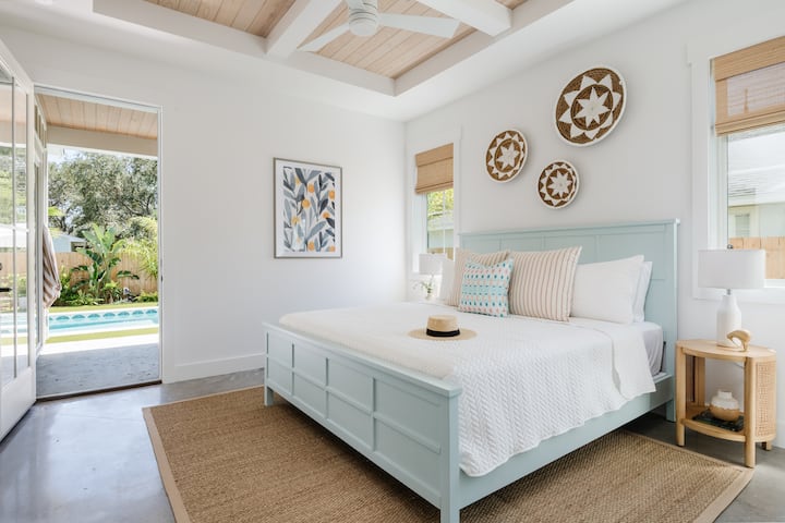 1st Floor King Suite with access to pool area and private large bathroom with walk-in shower. All bedrooms have pull-down bamboo shades + ceiling fan with remote.