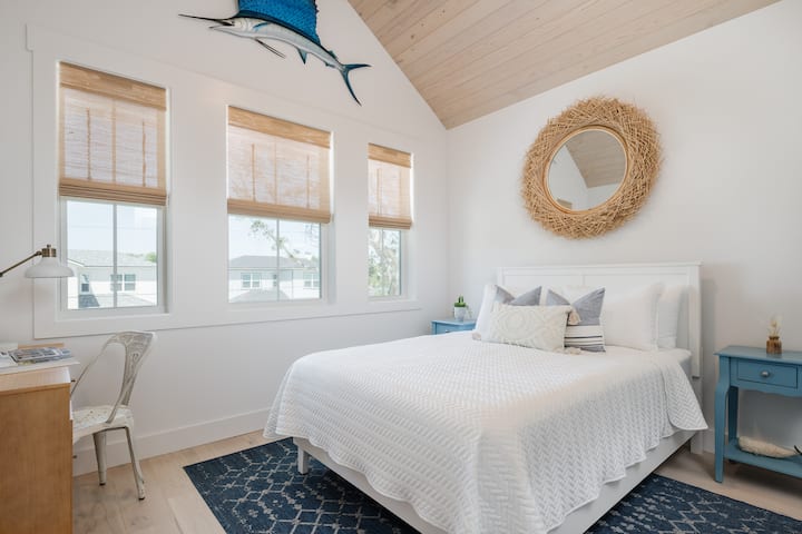2nd Floor Private Queen Guest Room- vaulted stained tongue & groove ceiling with pull-down bamboo shades + ceiling fan with remote. 