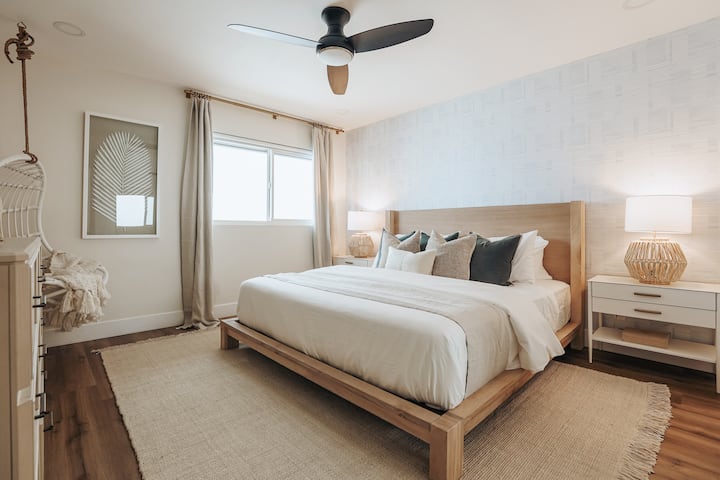 Bedroom #3 is an oversized 12' x 12' room with a king sized bed, 65" Samsung Smart TV and hanging chair.