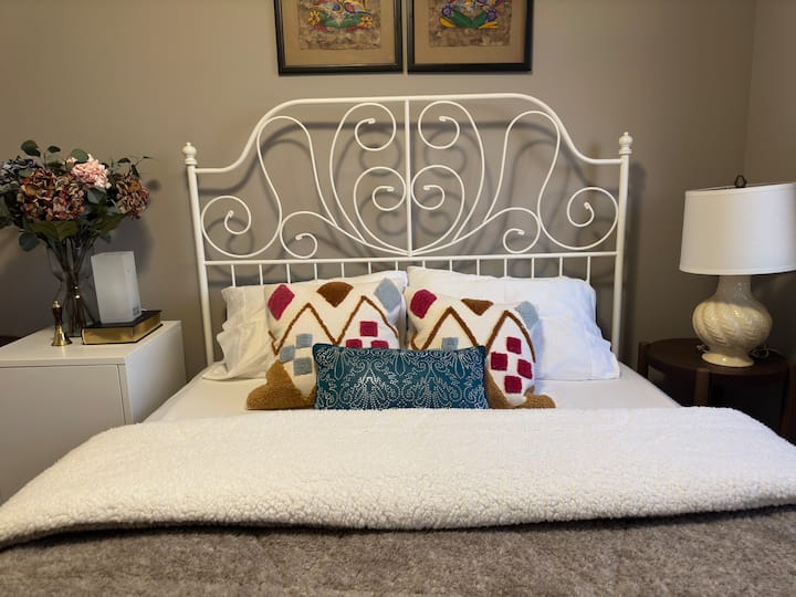 The Third Bedroom.  Queen bed with 2 side tables, lamp, clean beddings, towels, closets, and with big windows to overlook the stunning views of pond and lush greens during summer, spring and autumn.