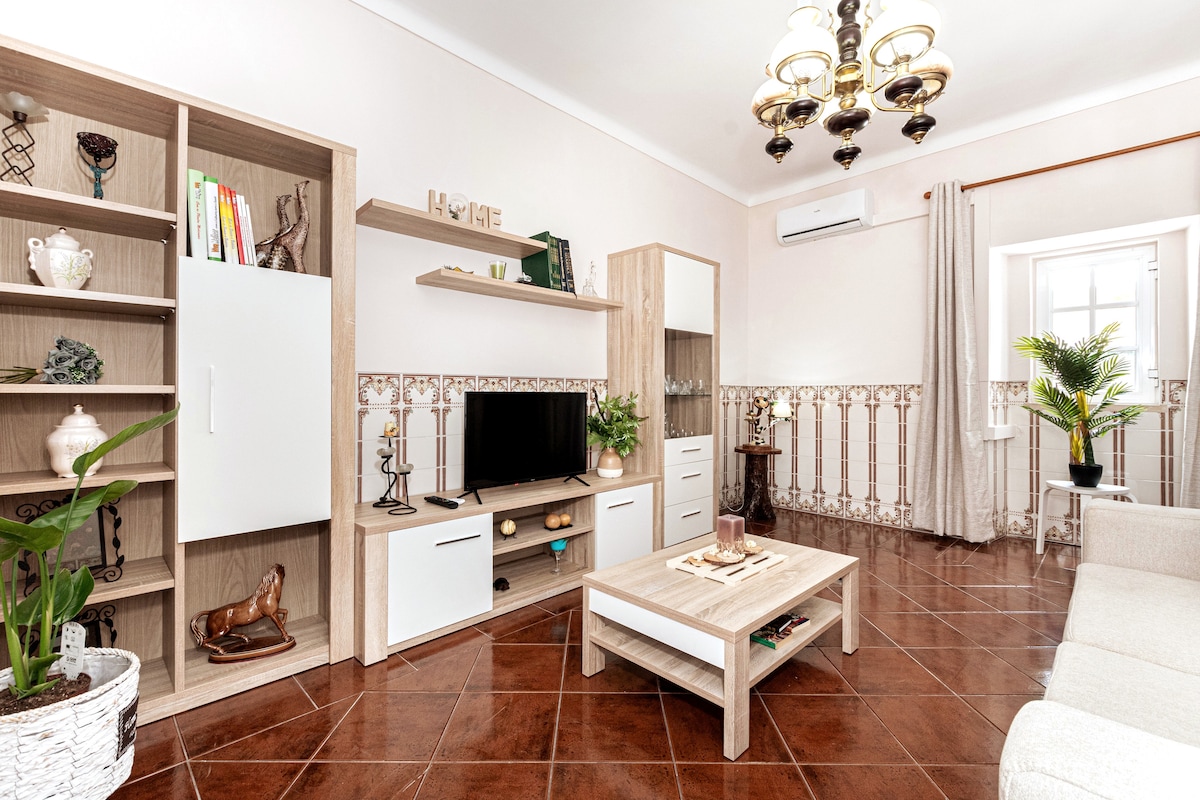 Sala de estar con sofá cama