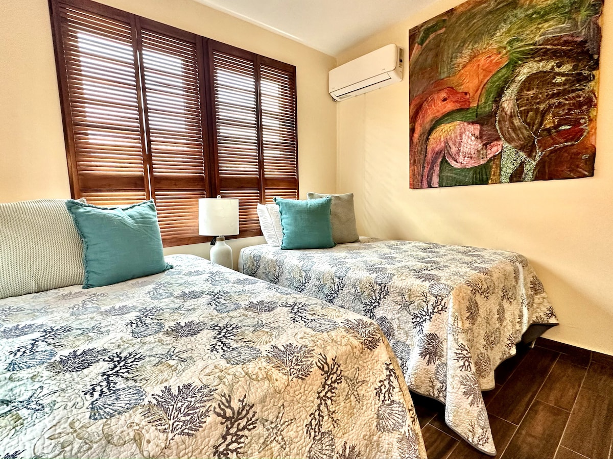 2 full size beds in guest bedroom